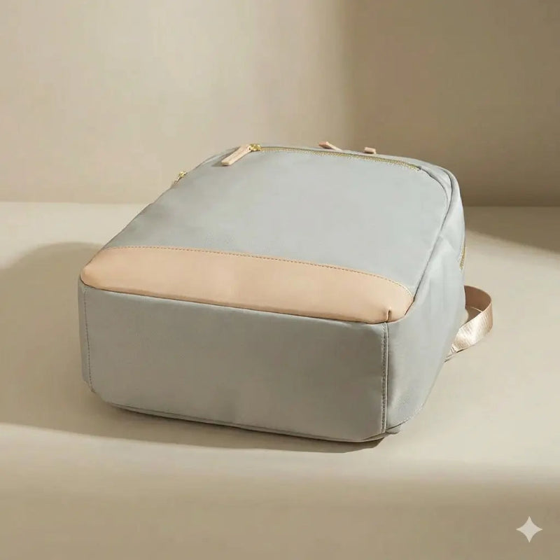 Dessous du sac à dos à langer bébé gris