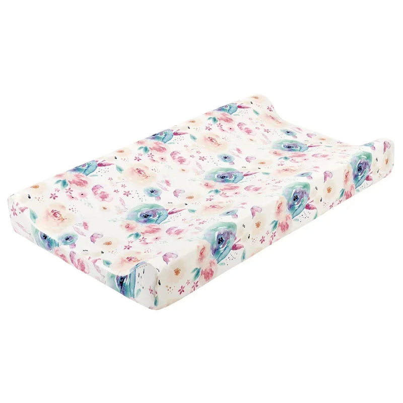 Matelas à langer fleuris pour bébé bleu