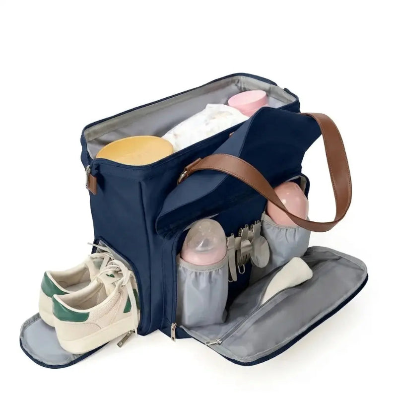 Ouvertures du sac à dos à langer bleu