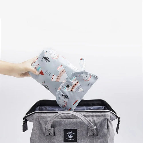 Petit sac à couche dans sac à langer