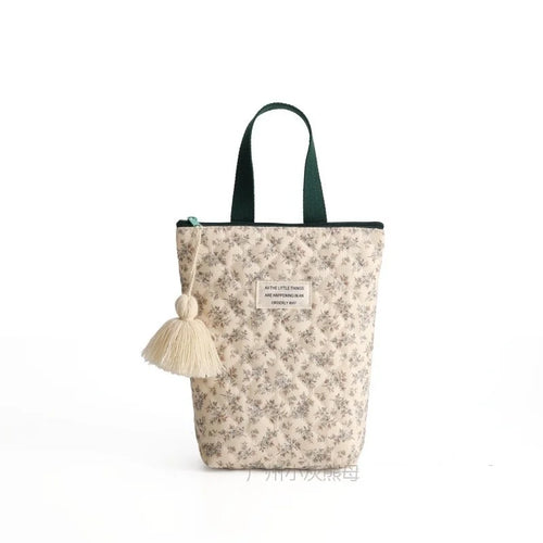 Petit sac à couche avec motif fleur verte