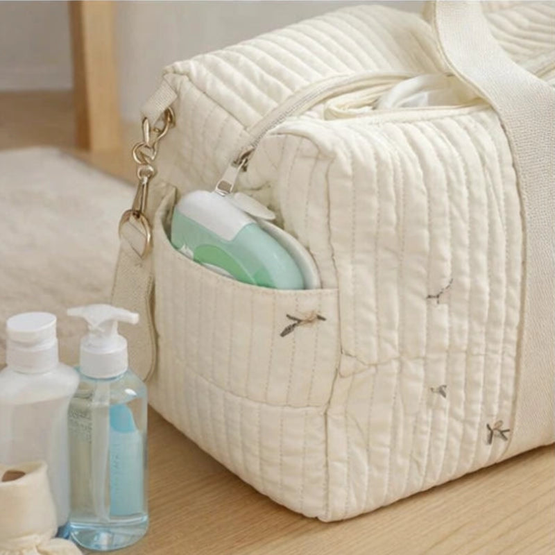 Poche extérieur du sac a langer en gaze de coton