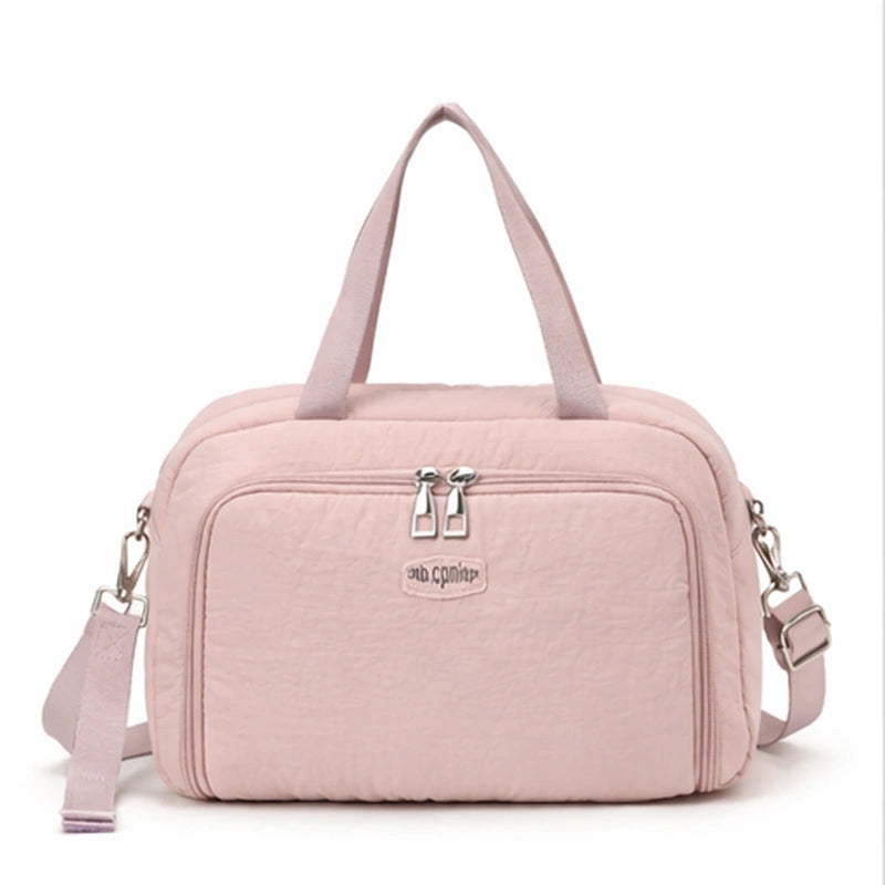 Sac à langer rose poudré​