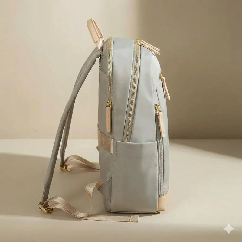 Sac à dos à langer bébé gris de profil