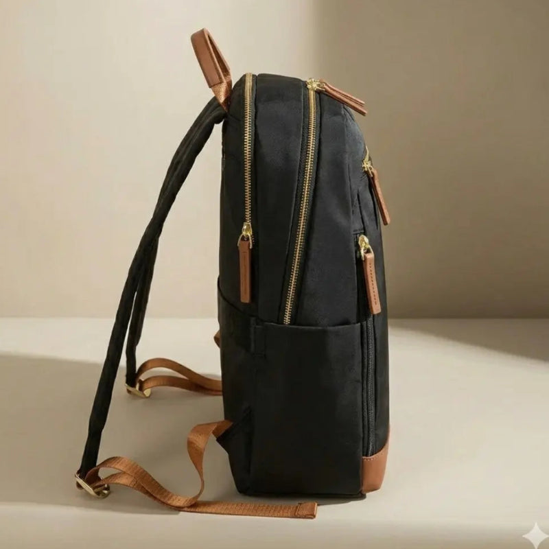 Sac à dos à langer bébé marron de profil