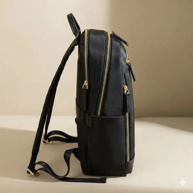 Sac à dos à langer bébé noir de profil