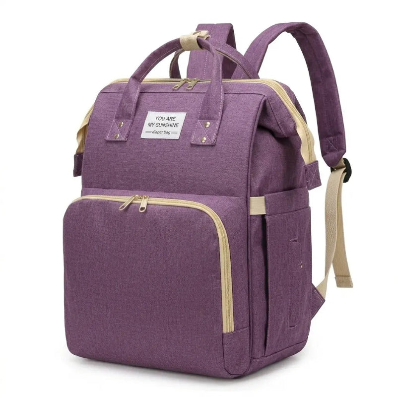 Sac à langer 3 en 1 violet sur fond blanc