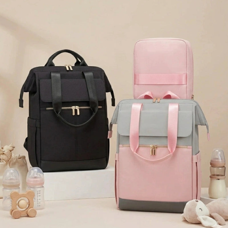 Sac a langer a dos rose avec affaires bébé