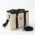 Sac a langer imperméable noir sur fond blanc