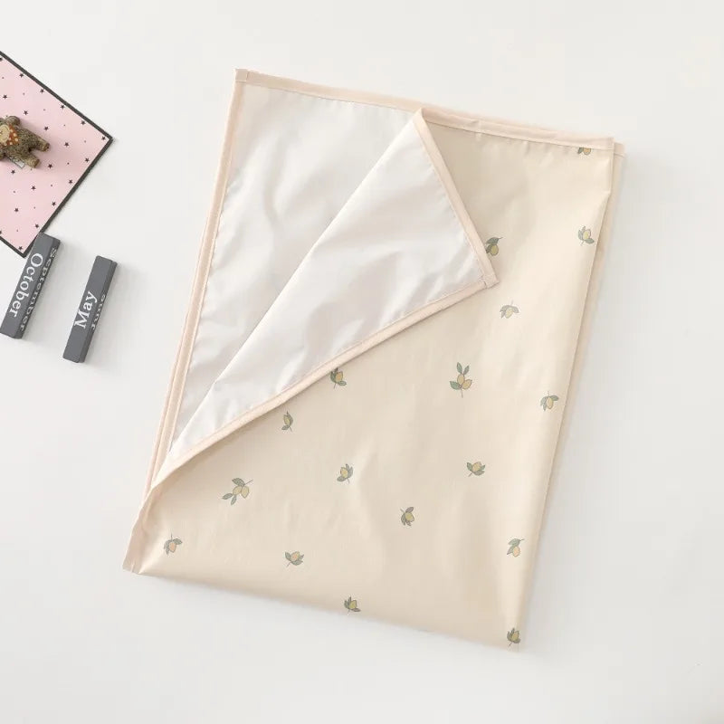 Tapis à langer nomade pour bébé olivier